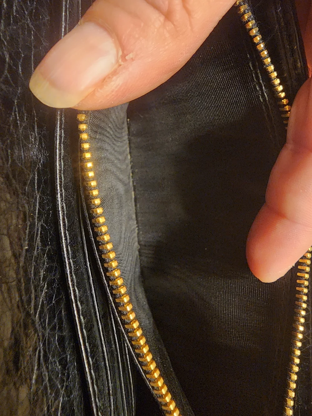 black quilted leather Miu Miu Matelassé long bifold wallet gold-tone Logo